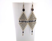 Losange earrings made with black faceted czech crystal beads and antiqued brass triangular filigrees