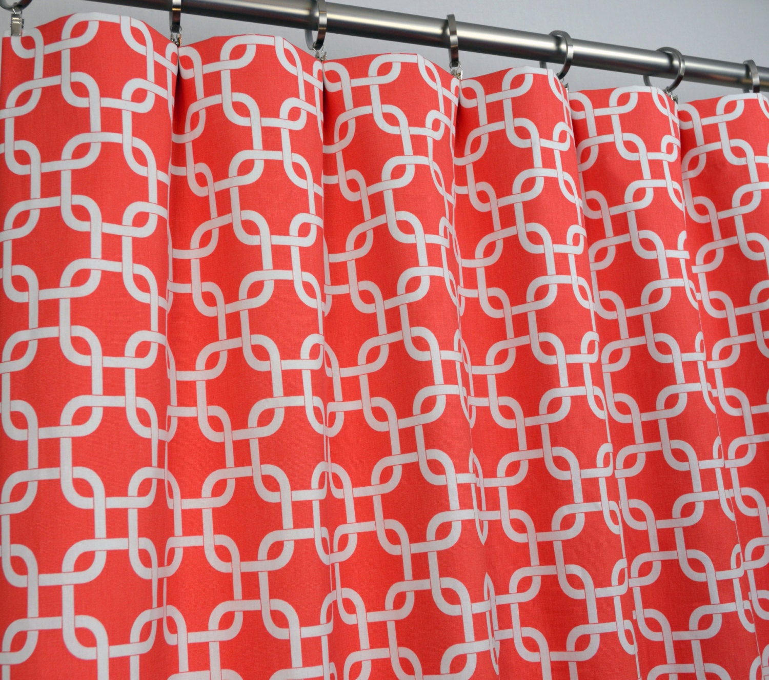Pair of Rod Pocket Curtains in Coral and White Gotcha Chain Link print