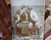Antique Real Photo Postcard Baseball Comic Romance Squeeze Play with Two Men Kissing a Woman Edwardian Era