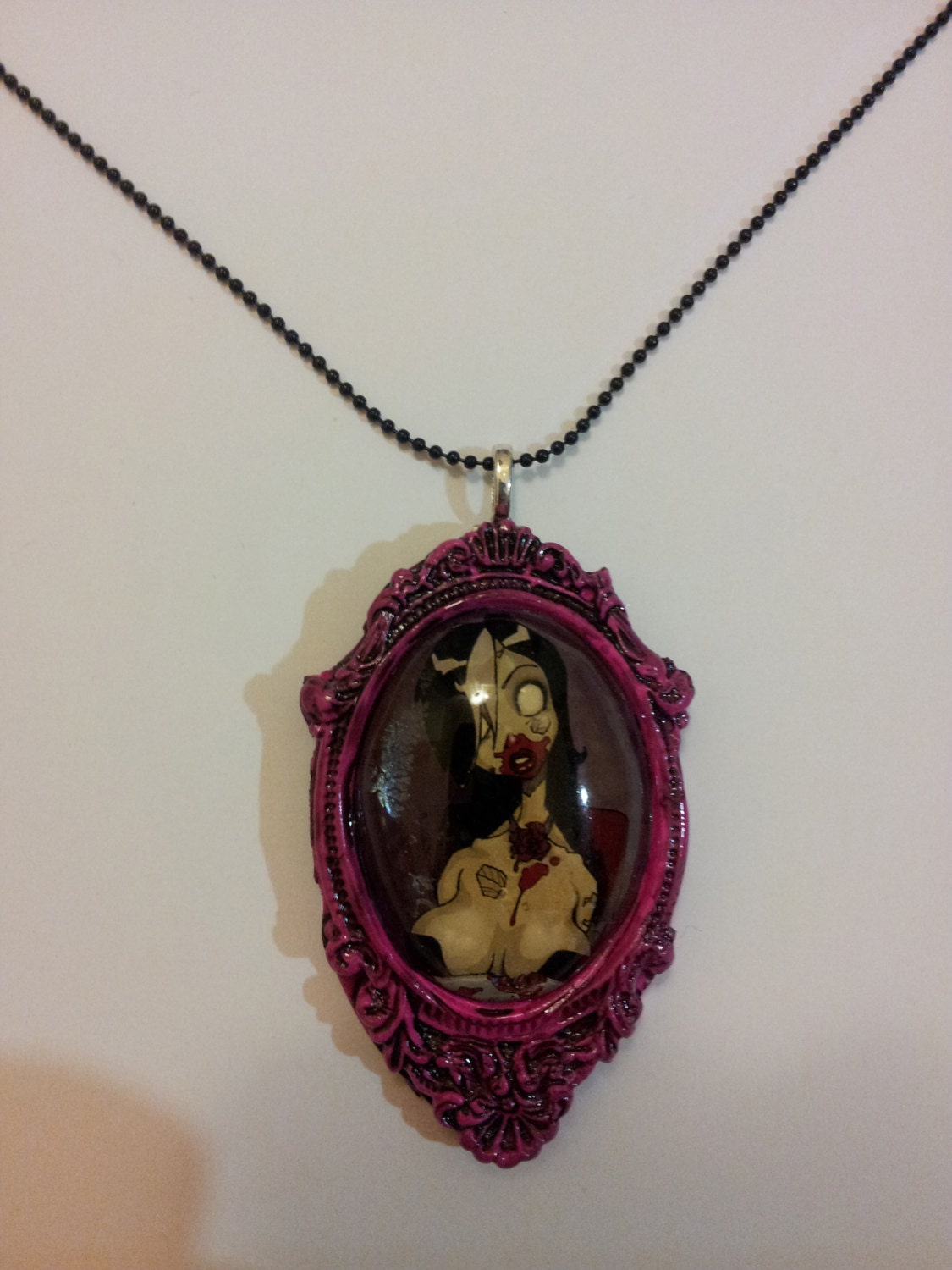zombie tramp domed resin necklace