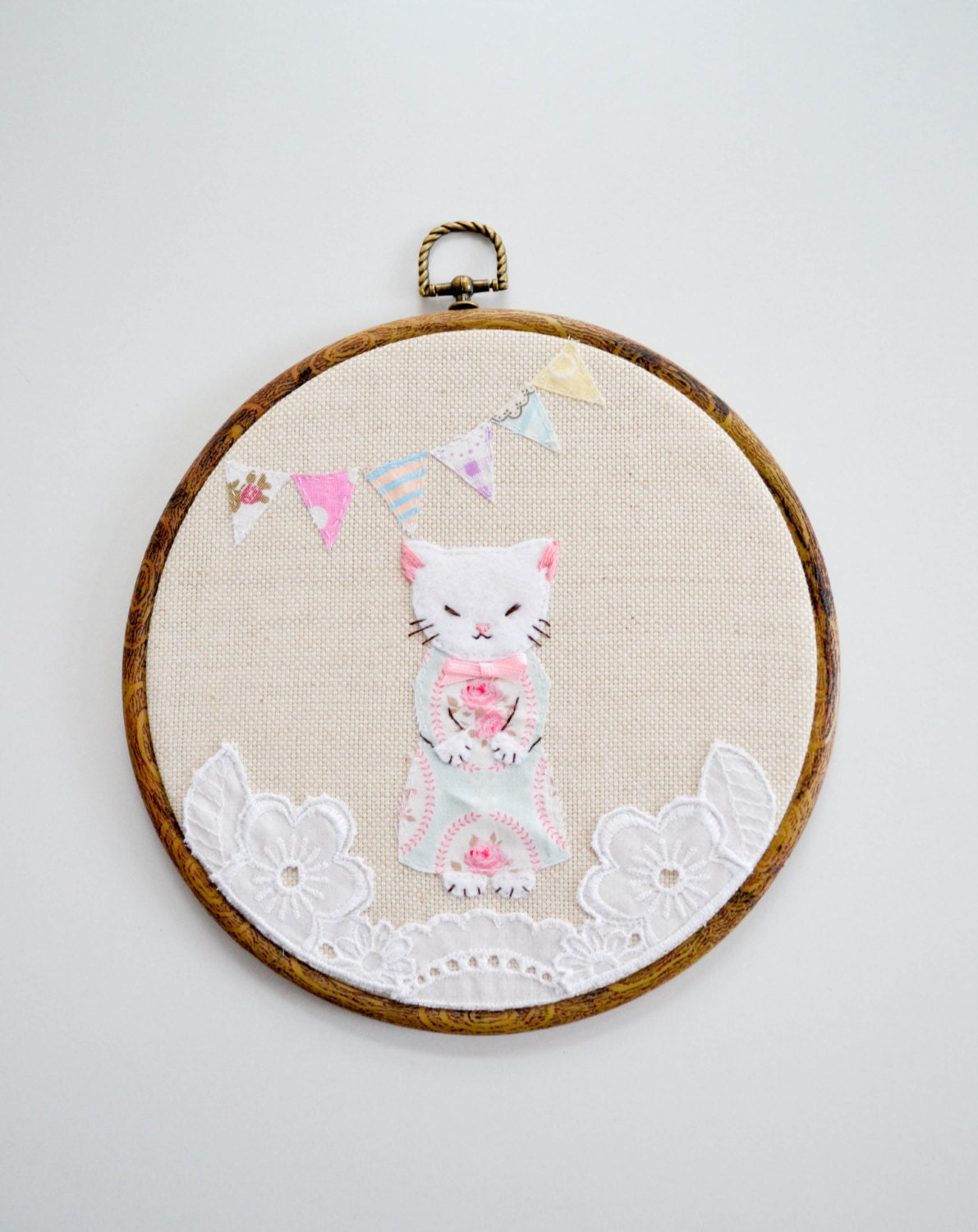 Cute vintage cat embroidery in a wooden hoop