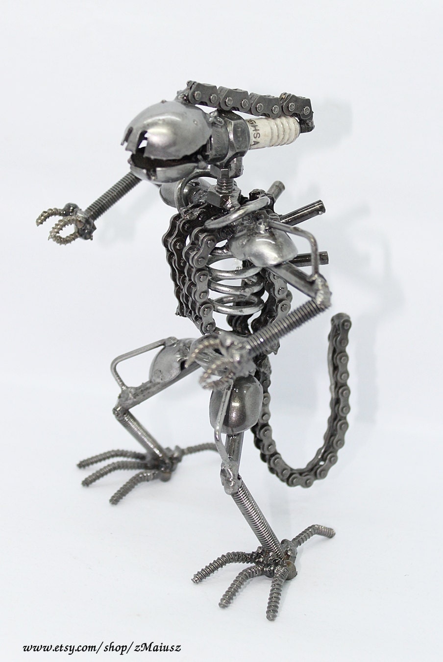 Handmade scrap metal alien with spark-plug head (6.3" tall)