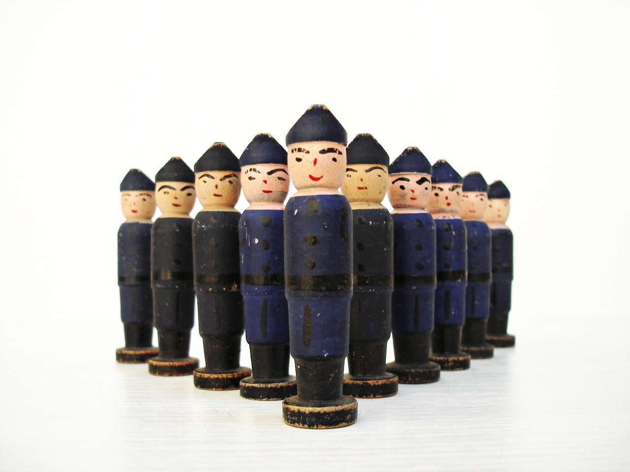 Reserved for S.       French Skittles. Set of 10 Policemen Bowling Pins.