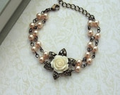 A Double Strand, Ivory Rose, Metal Flower, Two Strands Swarovski Peach Pearls, Adjustable Bracelet. Bridesmaid Gifts. Maid of Honor.