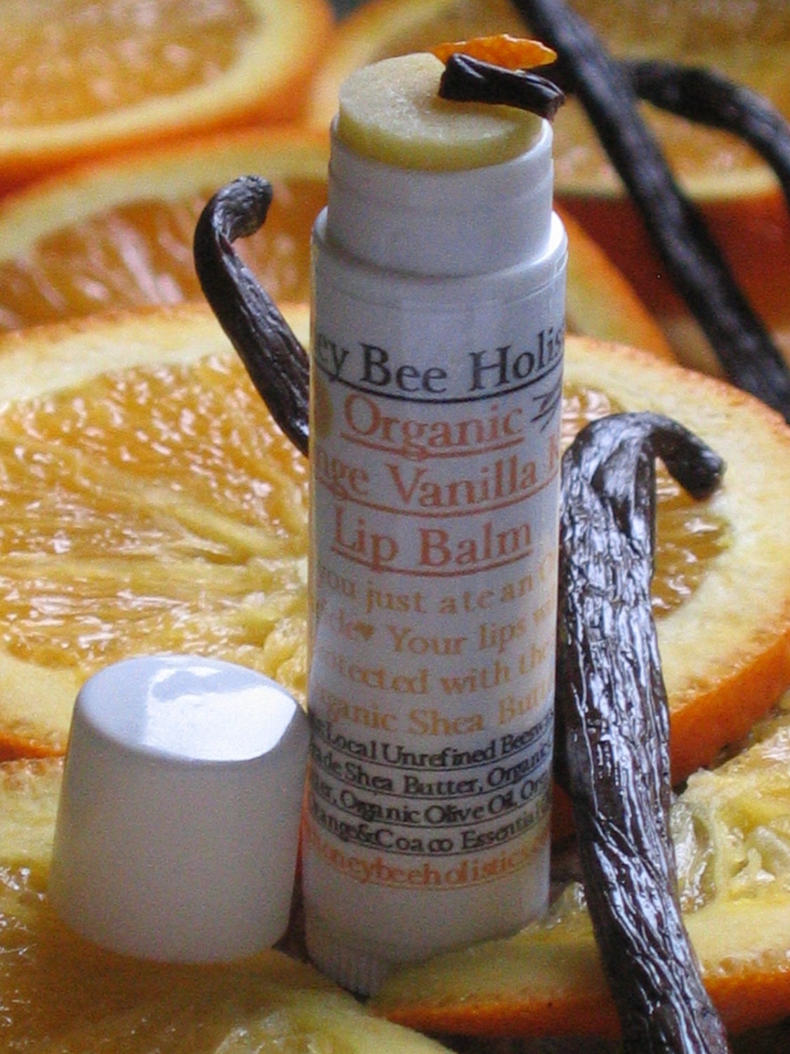 Organic Orange Vanilla Kiss Lip Balm made with Organic Vanilla Bean and Organic Orange Essential Oil in a twist tube