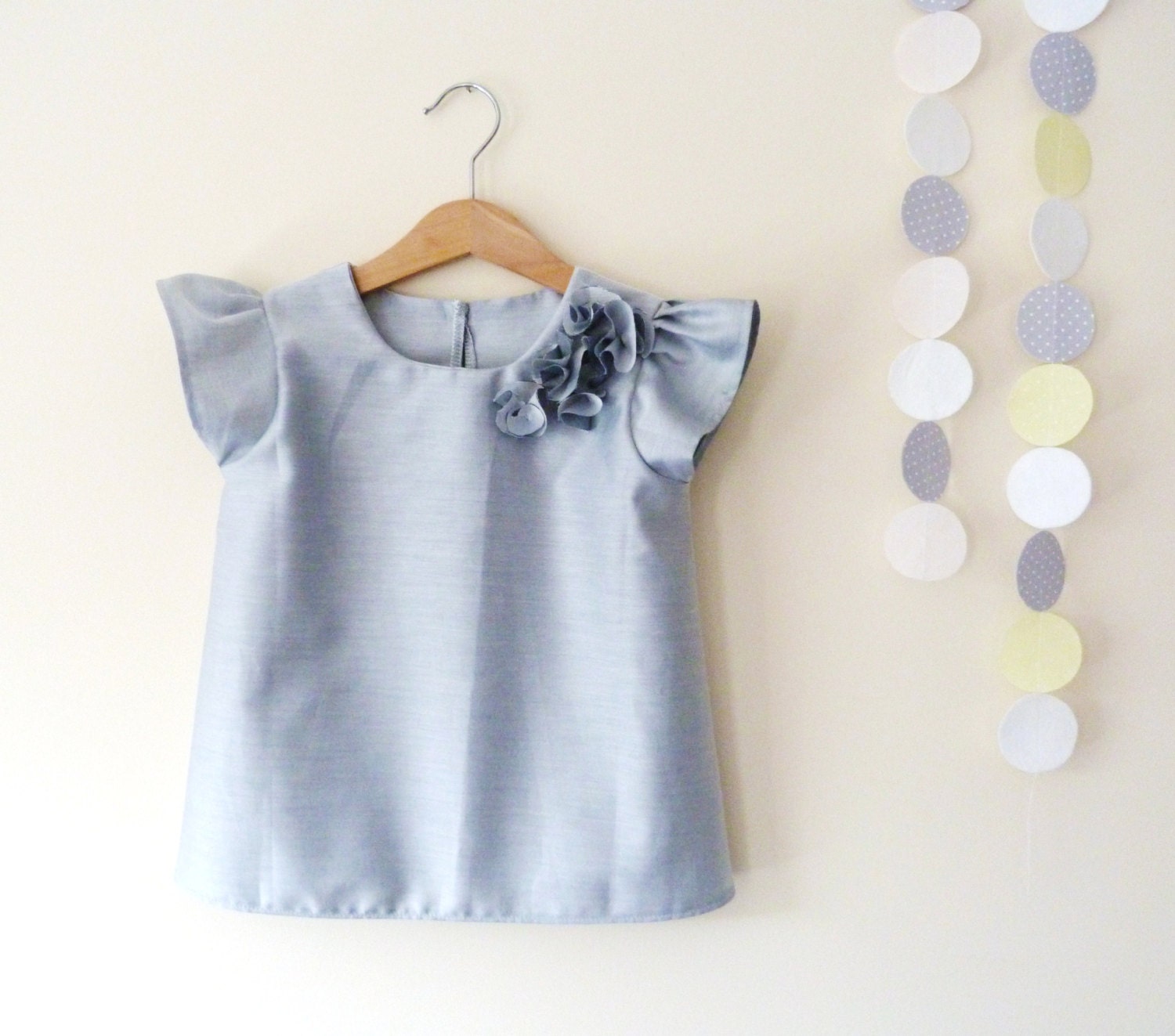 Girls Grey Blouse With Flower Detail And Short Ruffle Sleeves