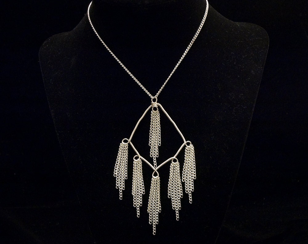 bright silver toned chain tassel pendant necklace with wire wrapped frame