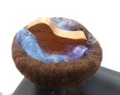 Wood bird with felted wool nest