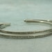 Custom Cuff Bracelet - hand stamped in NICKEL SILVER with your chosen message - by Kathryn Riechert (tiny text)