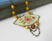 Red and white long vintage floral tin necklace