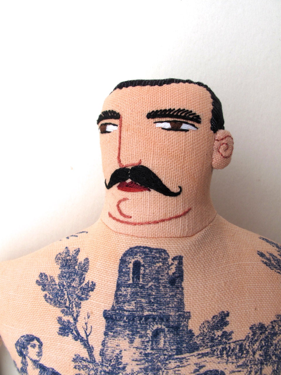 Big Tattoo Man doll Side Glance