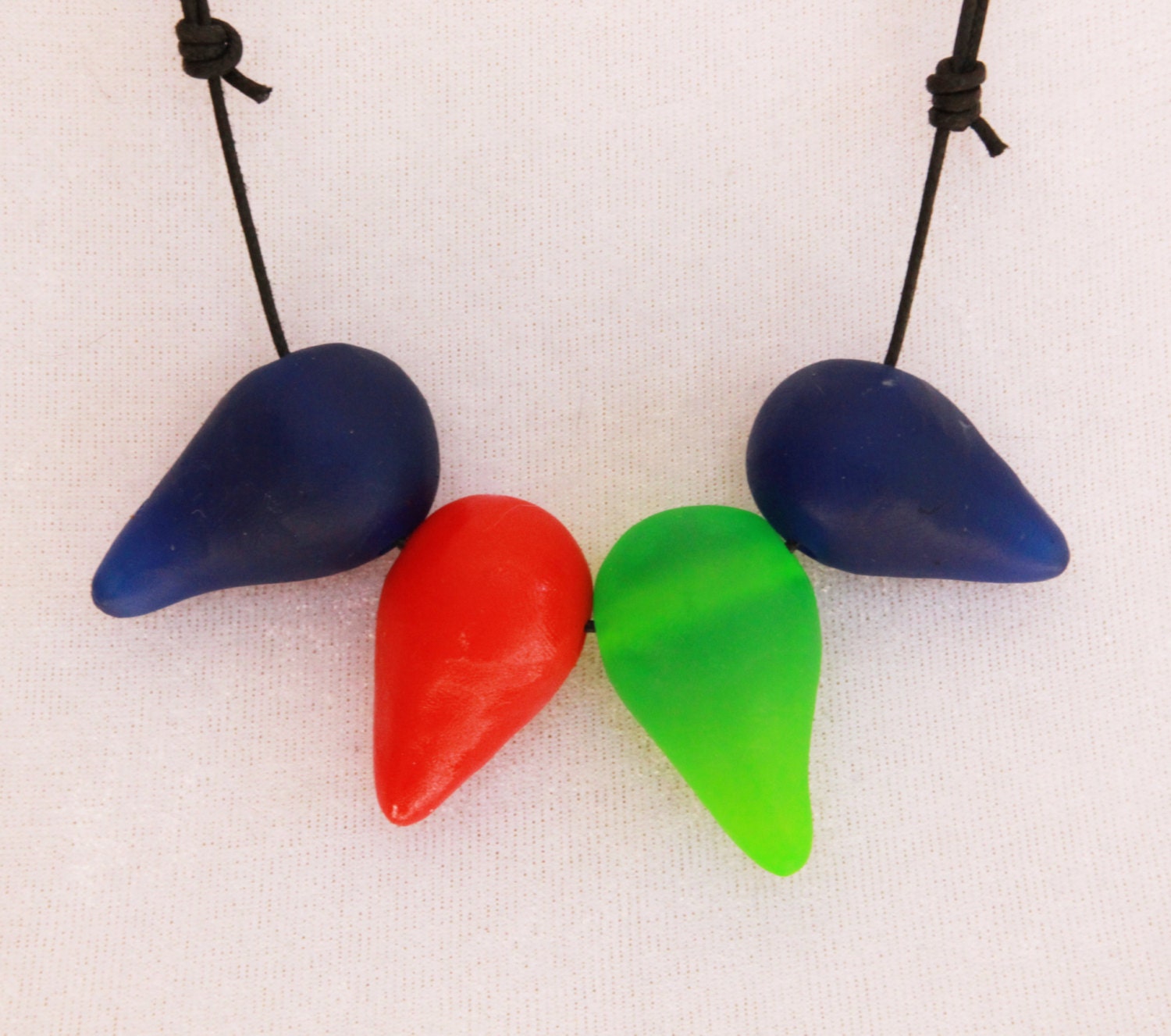 Neon lime, blue and red comma bead adjustable resin necklace