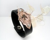 B1261  antiqued bird badge cufflet