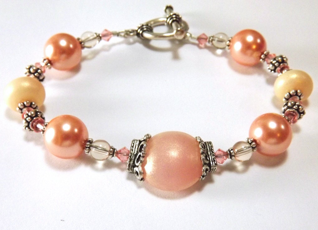 Peach lampwork bracelet, beaded bracelet with crysal, pearls and silver, Fuzzy Navel.