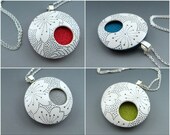 Simple and modern black and white pendant on chain in choice of colors