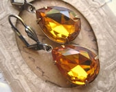 vintage topaz drop earrings in antiqued settings. Divine.