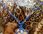 netted or caged beach stone blue beaded hemp adjustable necklace