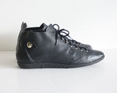 size 8.5 black perforated  leather details ankle boots