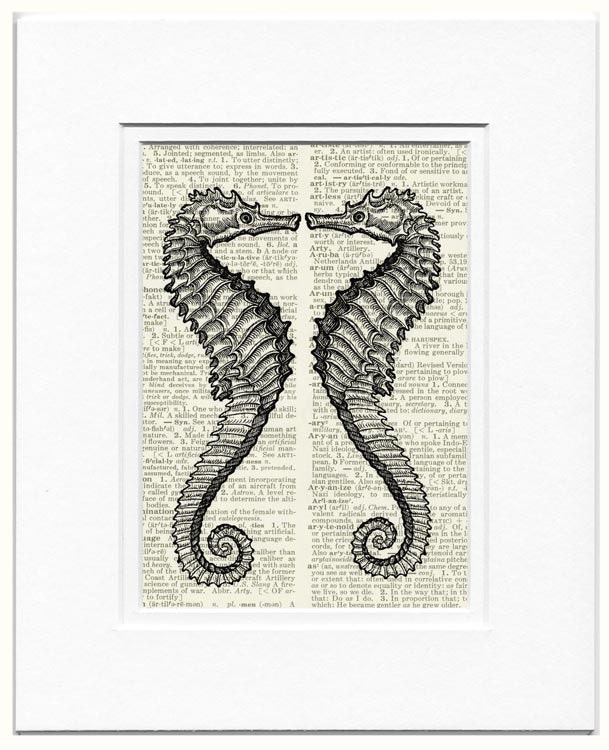 Vintage sea horses printed on page from old dictionary