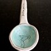 hanging SPOON (A.).