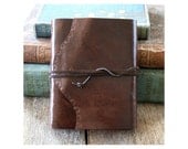Leather Travel Journal - J.R.R. Tolkien: "Not all those who wander are lost" . handmade handbound . hand embossed dark brown (320 pgs)