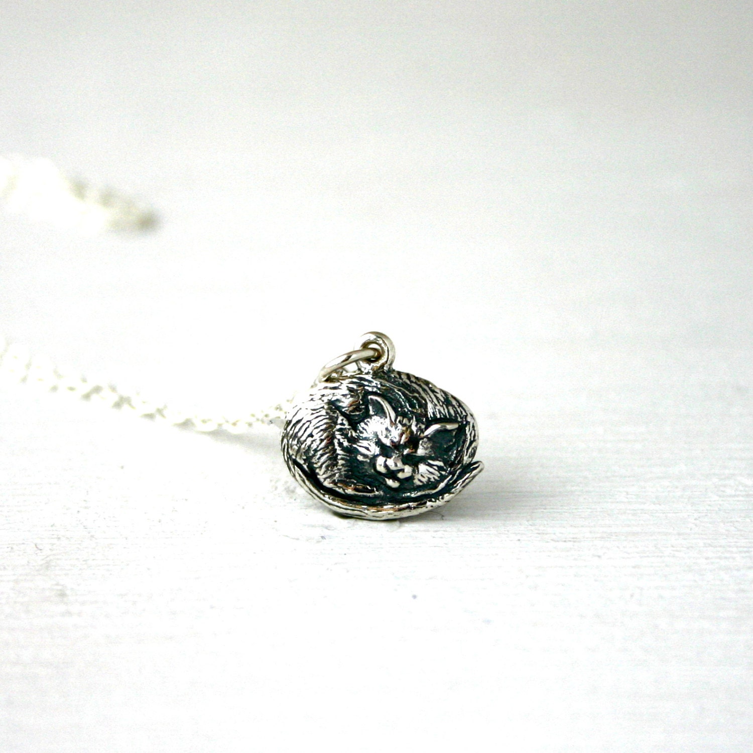 Sterling silver sleeping cat necklace