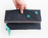 Navy with turquoise fold over small clutch