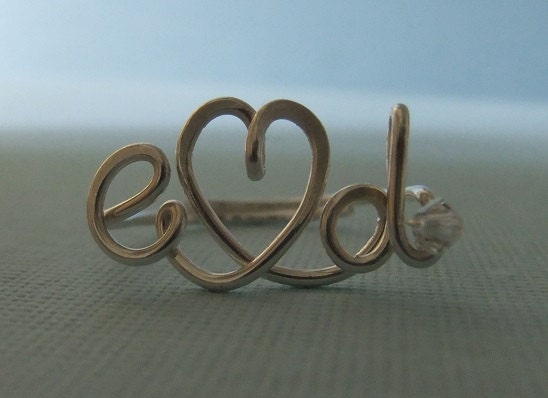 Two initials ring with heart with crystal