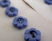 Eight vintage flower-shaped plastic buttons on original cards, sweet as can be