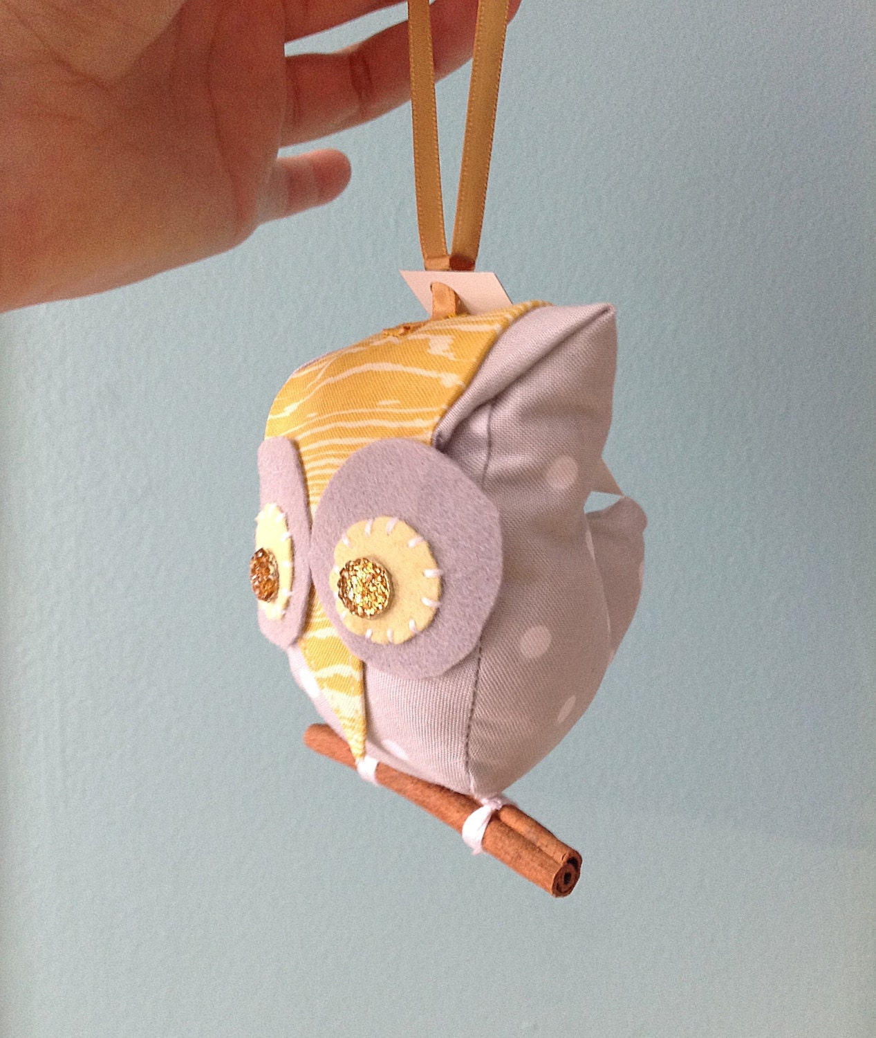 Small grey and yellow owl ornament