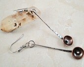 Long sterling silver stick earrings with copper disc. Texture. Drop earring. Dangle. Straight. Bowl shaped