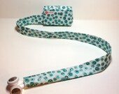 Turquoise and silver circles TuneTube.  Earbud cord organizer for iPhone or iPod.  Cord keeper.  Earbud holder.  Earbud case.