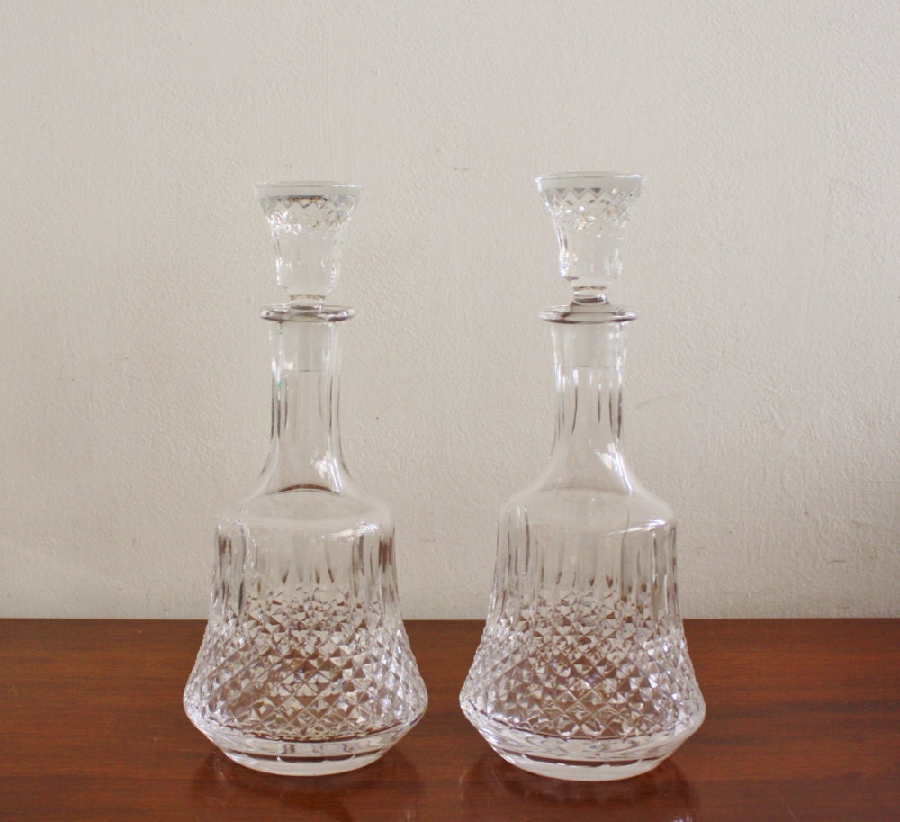 Vintage pair of crystal decanters with finial toppers