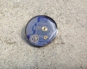 Blue purple robot with cogs badge