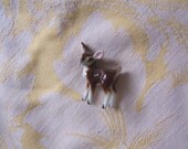 one itty bitty porcelain deer