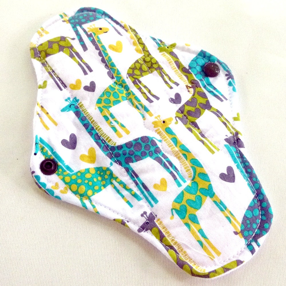 Medium/REGULAR flow reusable Cloth Menstrual Pad with PUL and wings - Giraffe Love - Quilter's Cotton top