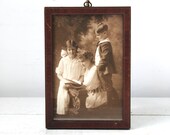 antique framed photograph. Mother and children reading. Edwardian family 1900s studio portrait. Dark wood frame. Mother's Day / home decor