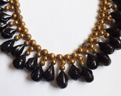 Memorial Day Sale Vintage early Miriam Haskell style statement necklace brass ball with black art glass bead fringe