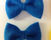Two pair pigtail bows, blue and yellow