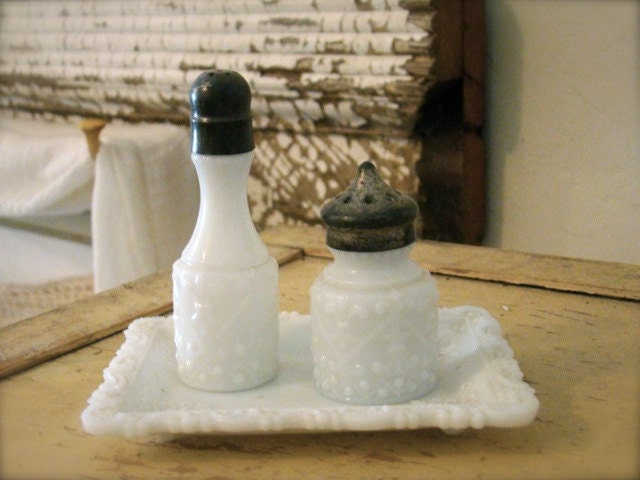 Fleur de Lis Salt and Pepper Shakers atop Tray