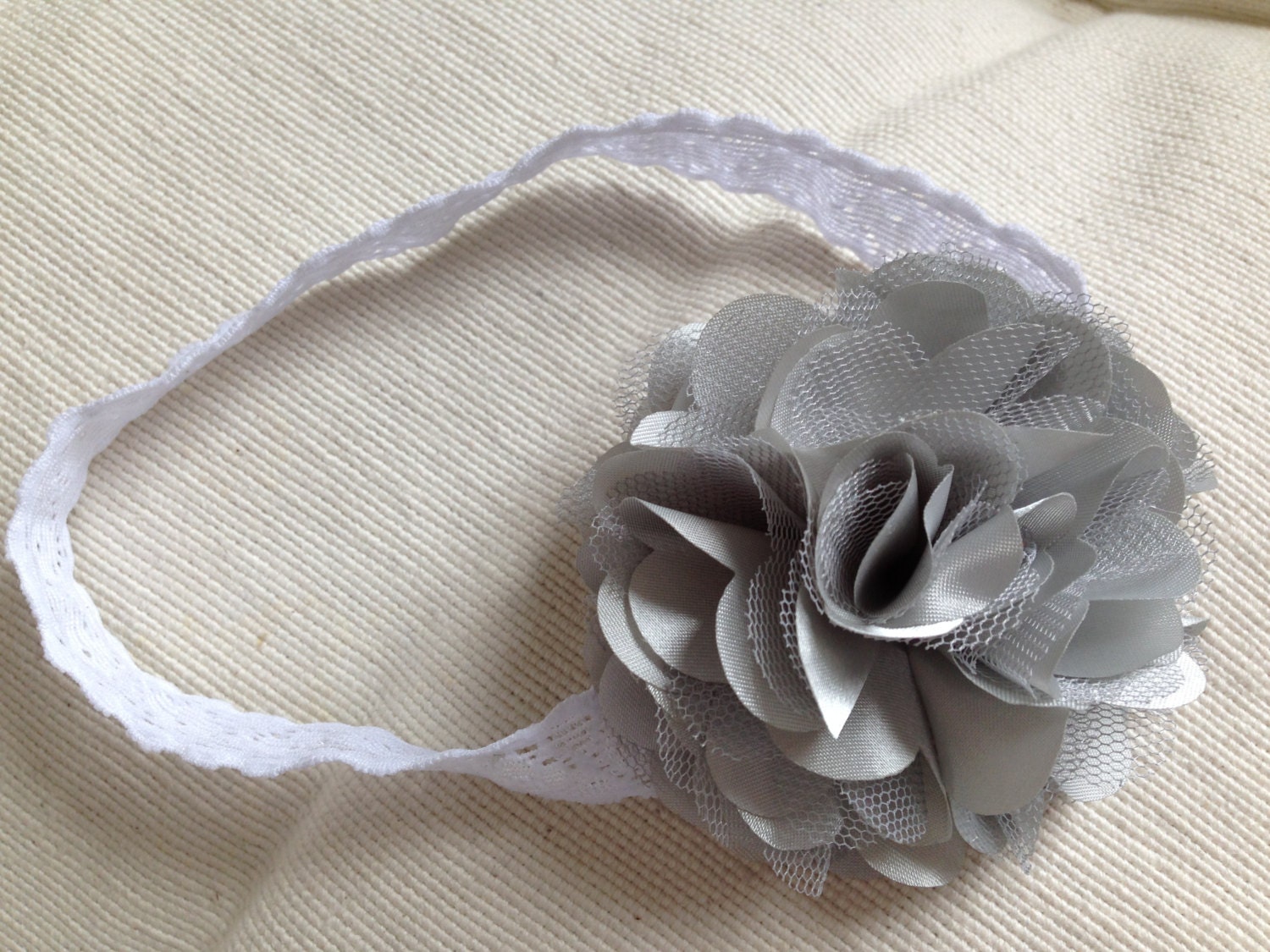 White Elastic Lace Headband with Large Grey Posy Flower