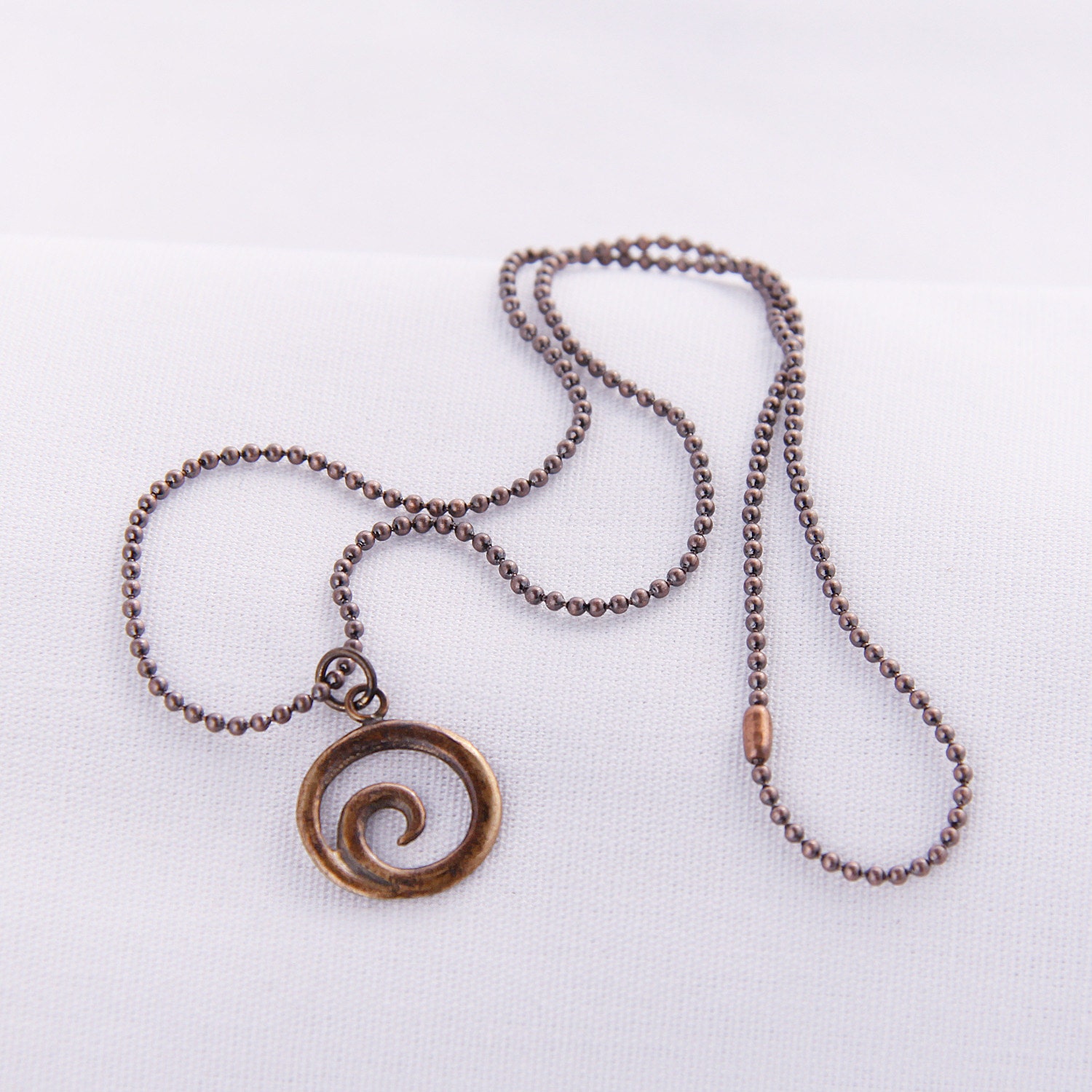 Constant Motion mini bronze pendant & copper ball chain