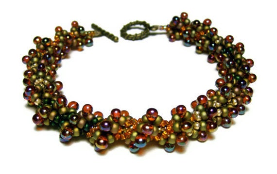 Handmade Beaded Bracelet Beadweaving Seed Beads Aurora Borealis Finish Khaki Green Gold Amber Drop Beads Spiral Pattern Art Jewelry 8 5/8"