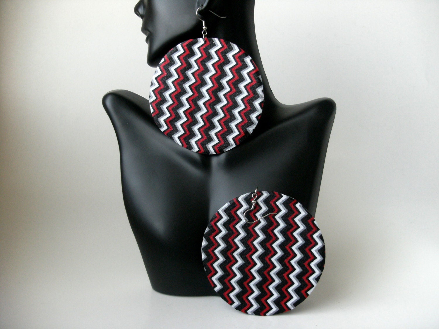Big circle fabric earrings - red, black, and white zigzag print