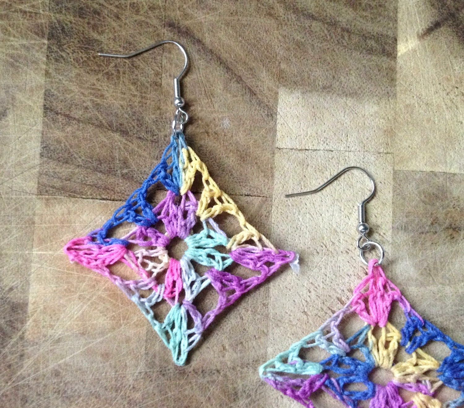 small lacy crochet granny square earrings . light rainbow .