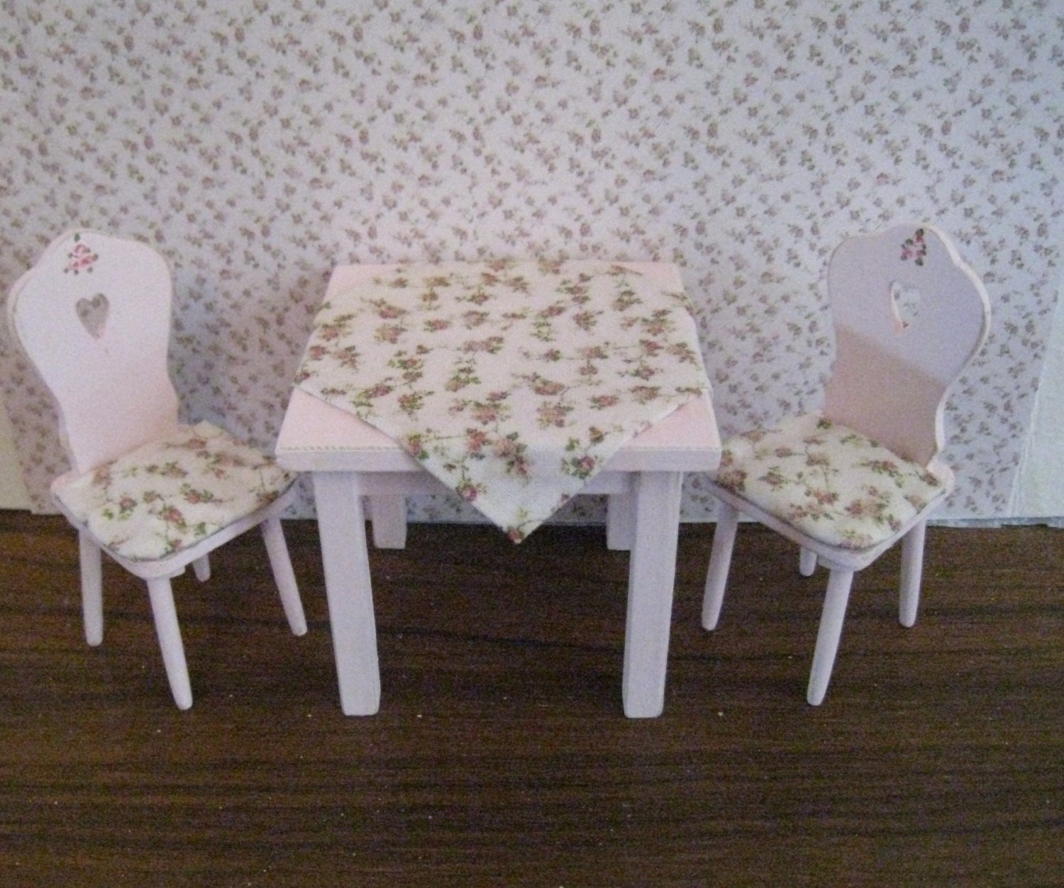 RESERVED for PATTY.   Small pink  table and two chairs,plus shabby chic dresser with a few rosebuds.