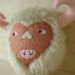 Fuzzy monster ornament, tan and pink