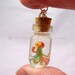 Miniature rainbow octopus. Polymer clay bottle necklace or keyring. Free US shipping.