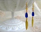 Golden Feather Earrings. Cobalt Blue Earrings. Yellow Earrings. Gold Earrings. Feather Jewelry. Long Drop Earrings. Crystal, Lucite, Metal.