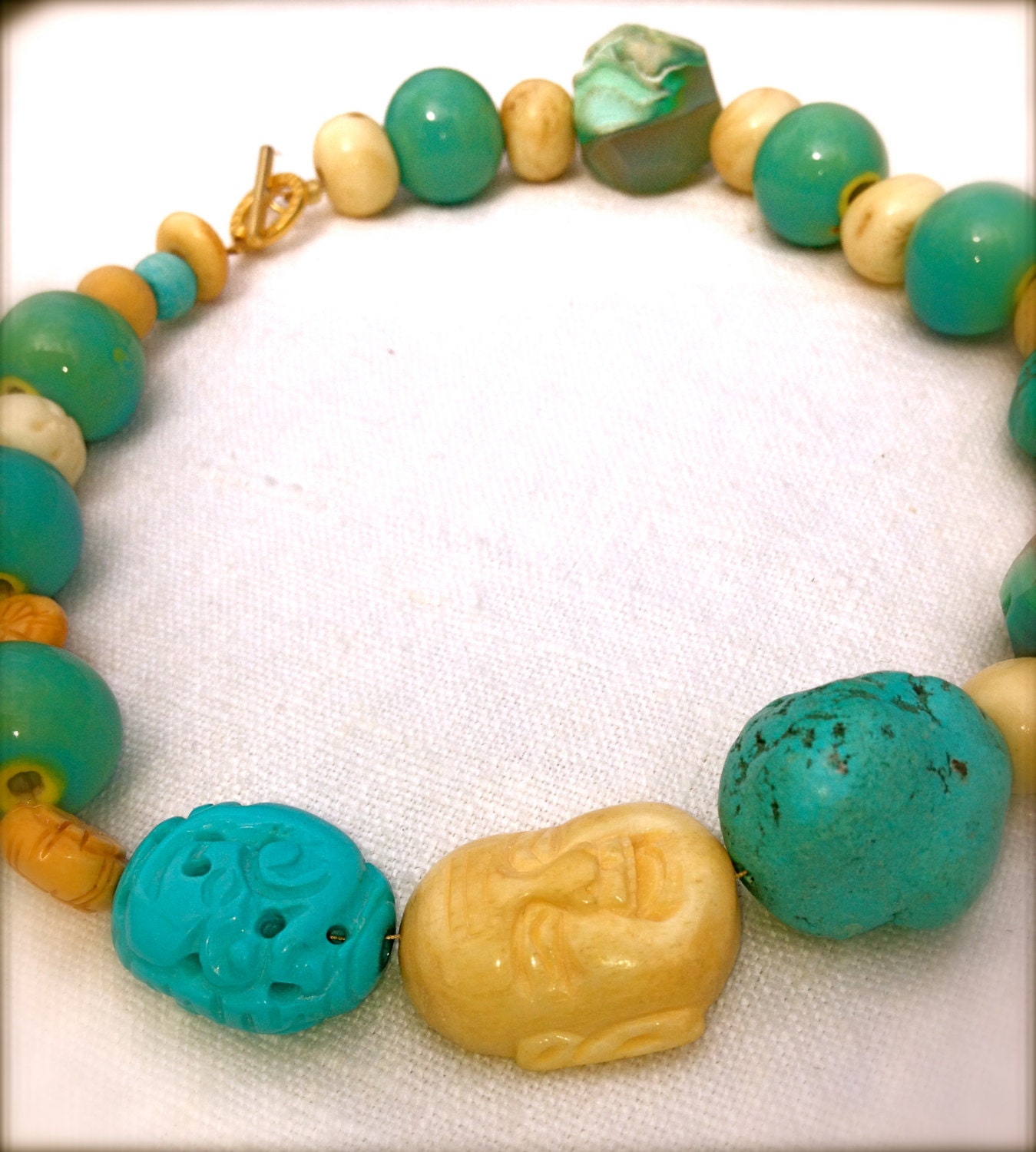 Chunky buddha, turquois, bone carved beads and raw cut moonstone
